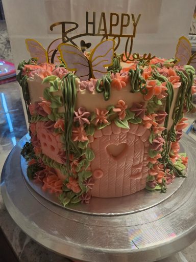 Whimsical garden fairy cake